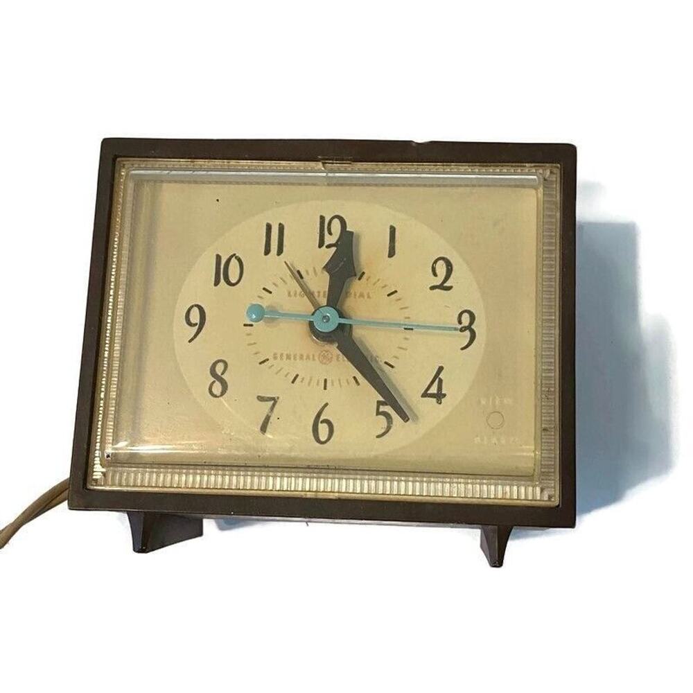Vintage Brown Electric Alarm Clock with Blue Hands